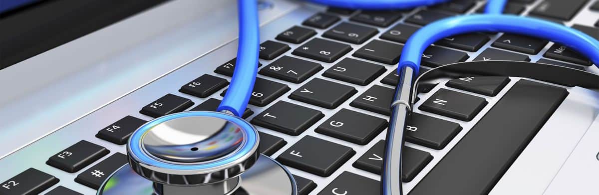 Image of a stethoscope on a keyboard to reflect computer repair